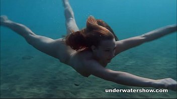 julia is swimming underwater nude youjisz in the sea 